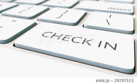 White computer keyboard and check in key, shallow 28292523