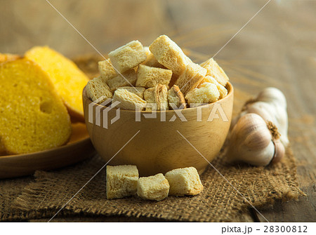 Crispy Bread in wood bowl on table 28300812