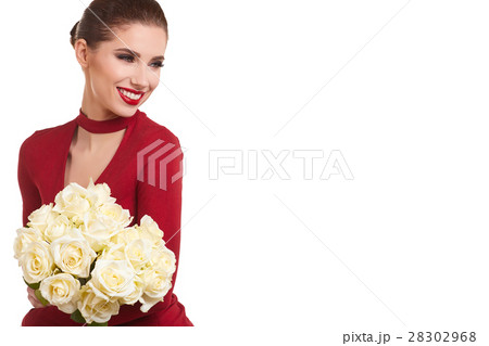 woman holding bunch of white roses and looking at camera. Valen woman holding bunch of white roses and looking at camera. Valen 28302968