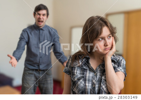 Argue of young couple. Angry man is arguing. Argue of young couple. Angry man is arguing. 28303149