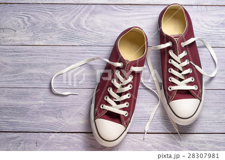 pair sneakers on a wooden background 28307981