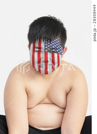 Smile cute fat boy with American flag on his face Smile cute fat boy with American flag on his face 28309444