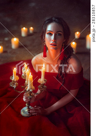 Beautiful lady with candles 28310857