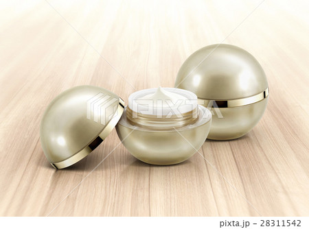 Golden sphere cosmetic jar on wood background Golden sphere cosmetic jar on wood background 28311542