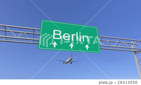 Twin engine commercial airplane arriving to Berlin Twin engine commercial airplane arriving to Berlin 28313050