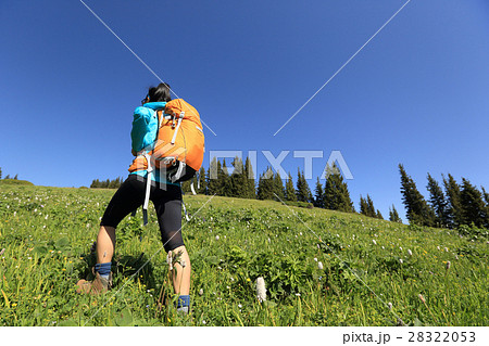 young woman hiker hiking in beautiful mountains 28322053