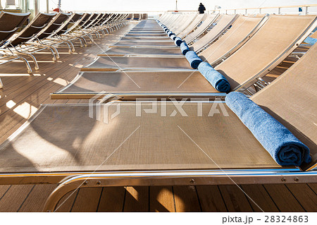 outdoor lounge area on stern of cruise liner 28324863