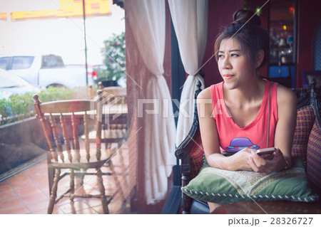 women lifestyle used a mobile phone in cafe coffee women lifestyle used a mobile phone in cafe coffee 28326727