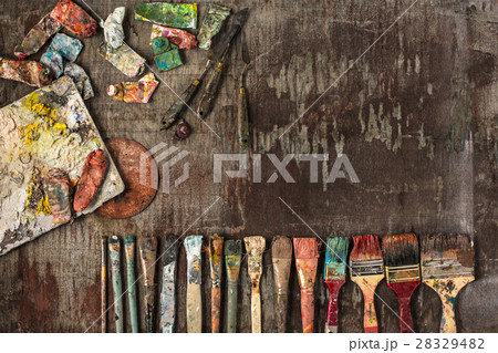 paint brushes and tubes of oil paints on wooden paint brushes and tubes of oil paints on wooden 28329482