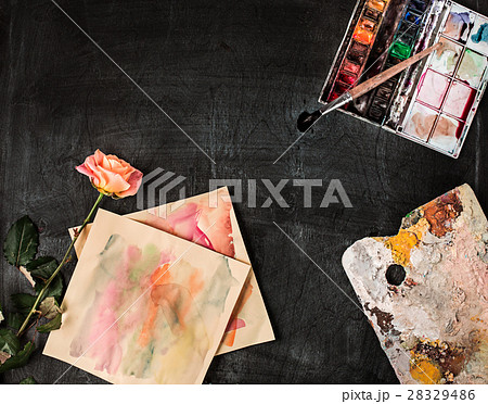 paint brushes and tubes of oil paints on wooden 28329486