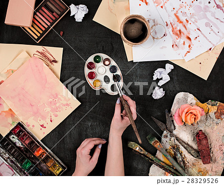 paint brushes and tubes of oil paints on wooden paint brushes and tubes of oil paints on wooden 28329526