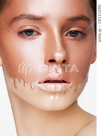 Beauty portrait with foundation makeup over face Beauty portrait with foundation makeup over face 28331090