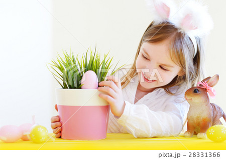 Adorable little girl wearing bunny ears 28331366