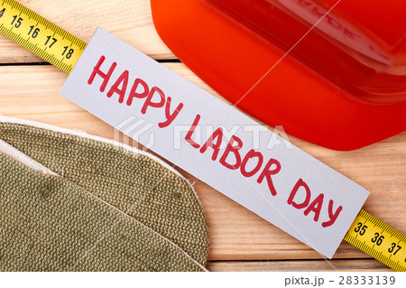 Hard hat and tape measure. Hard hat and tape measure. 28333139