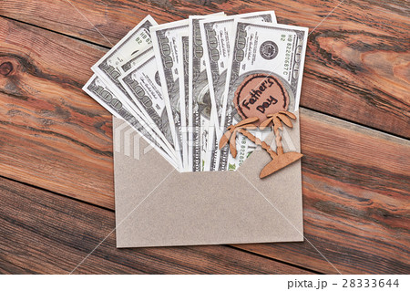Dollar bills in envelope. Dollar bills in envelope. 28333644