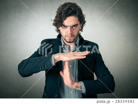Man making a stop sign Man making a stop sign 28334391