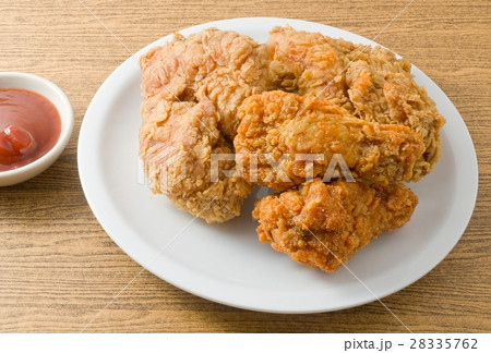 Fried Chicken with Sauce on A White Dish Fried Chicken with Sauce on A White Dish 28335762