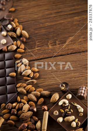 Cinnamon, Dark chocolate with milk and candy sweet Cinnamon, Dark chocolate with milk and candy sweet 28337876