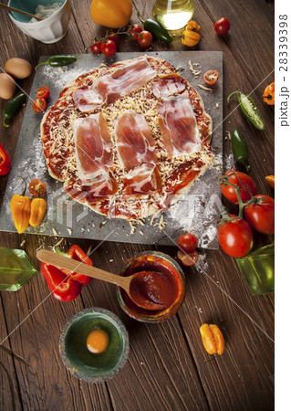 Delicious pizza served on wooden table Delicious pizza served on wooden table 28339398