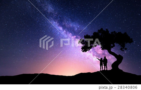 Milky Way with people under the tree on the hil Milky Way with people under the tree on the hil 28340806