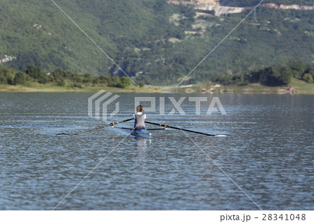 Child in the course of rowing on single 28341048