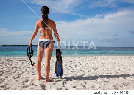 Girl and snorkeling gear Girl and snorkeling gear 28344406
