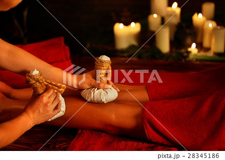 Feet massage with Thai reflexology. Top view of Feet massage with Thai reflexology. Top view of 28345186