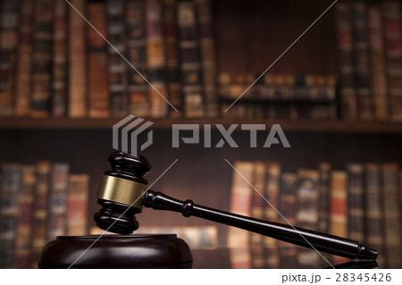 Law theme, mallet of the judge, wooden desk, books Law theme, mallet of the judge, wooden desk, books 28345426