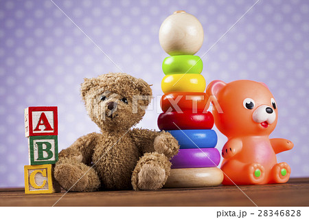 Children's of toy accessories on wooden background Children's of toy accessories on wooden background 28346828