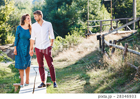 Couple walking in the countryside Couple walking in the countryside 28346933