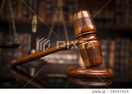 Law theme, mallet of the judge, wooden desk, books Law theme, mallet of the judge, wooden desk, books 28347424