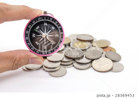 compass and coins on white background compass and coins on white background 28369453