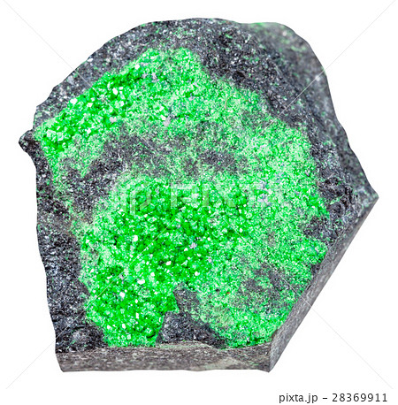 uvarovite crystals on stone isolated uvarovite crystals on stone isolated 28369911
