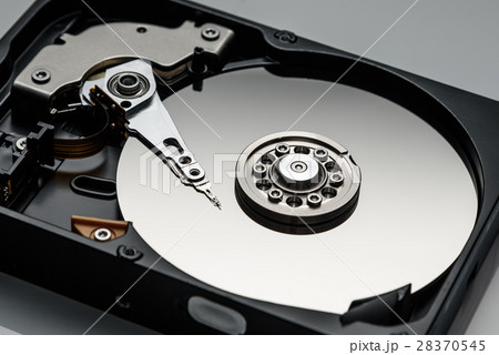 disassembled computer hard drive silver color disassembled computer hard drive silver color 28370545
