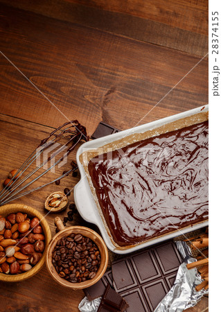 Baking chocolate cake in rural or rustic kitchen. 28374155