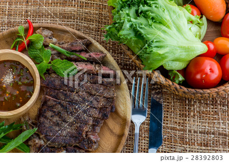 grilled beef steak with spicy sauce lemon grilled beef steak with spicy sauce lemon 28392803