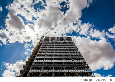 Crane and building construction. 28395110