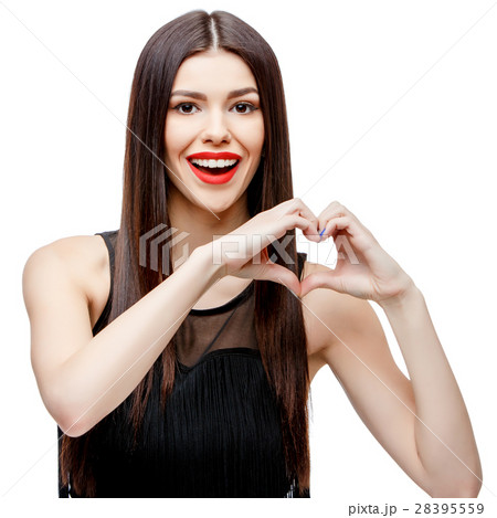 Beautiful young woman doing a heart shape with her Beautiful young woman doing a heart shape with her 28395559