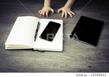 calendar with pen, cellphone tablet child hands 28398041