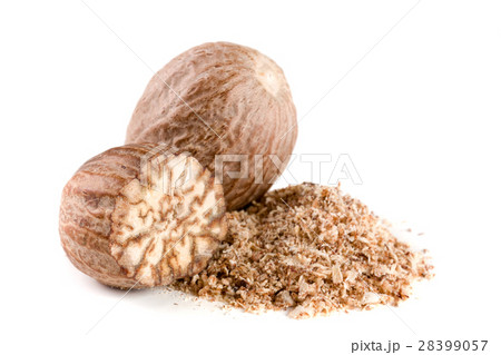 two nutmeg and powder isolated on white background two nutmeg and powder isolated on white background 28399057