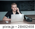 student is preparing for a lecture in classroom 28402408