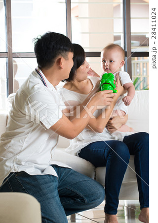 asian parent playing education toy with baby asian parent playing education toy with baby 28411024