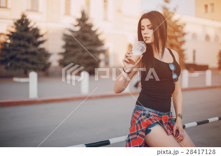 young girl walking in the city young girl walking in the city 28417128