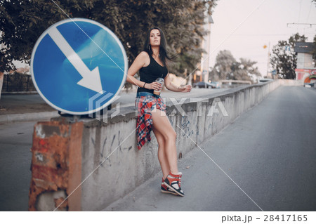 young girl walking in the city 28417165
