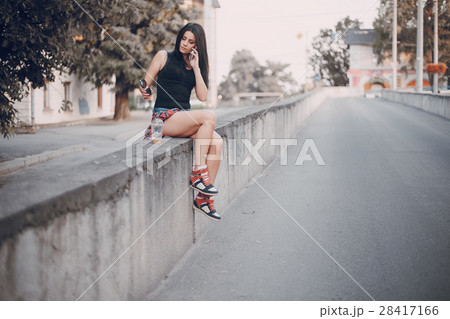 young girl walking in the city young girl walking in the city 28417166