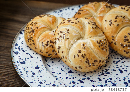 Freshly baked pastry on a plate 28418737