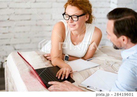 Decent middle aged couple working on the project 28419601