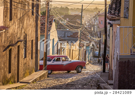 Cuban street with oldtimer in Trinidad 28421089