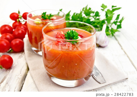 Soup tomato in two glasses on board 28422783