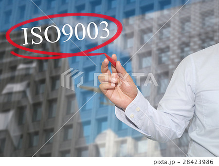 Hand of young businessman write the word ISO 9003 28423986